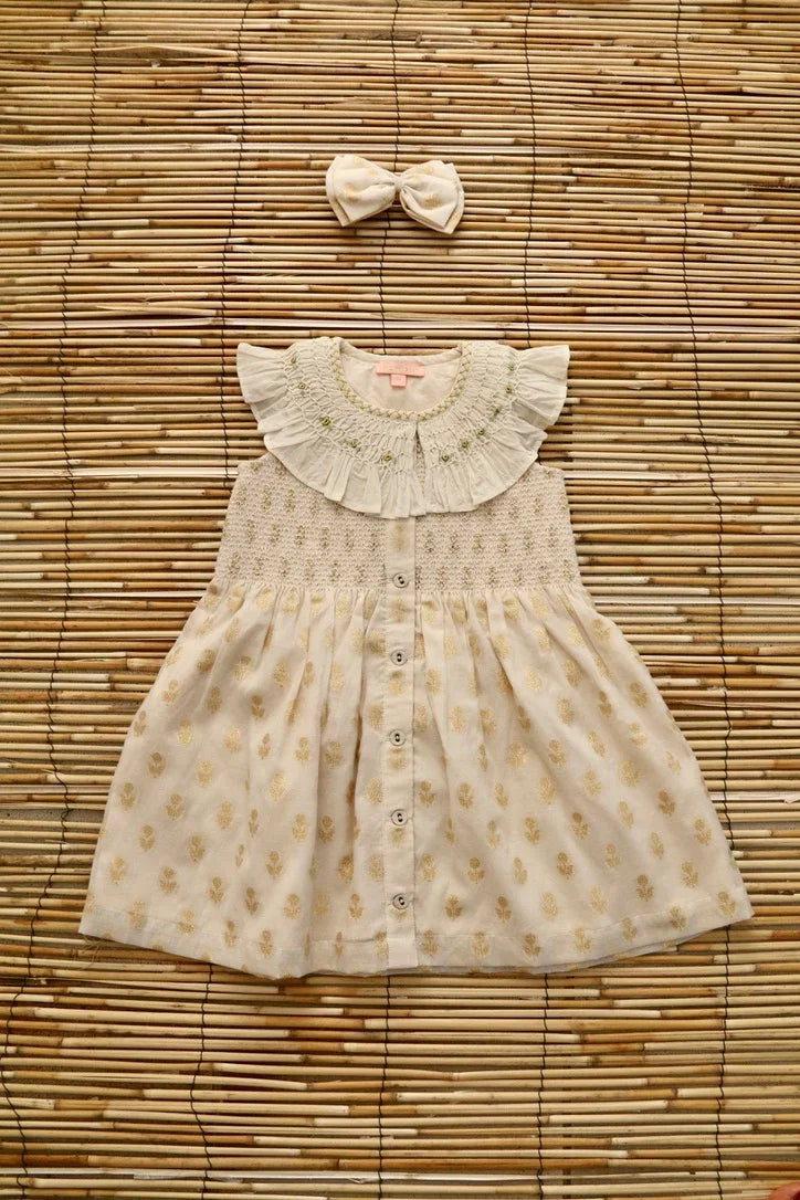 American armhole tunic and its bow barrette