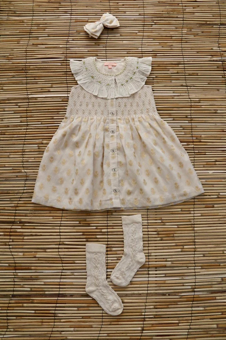 American armhole tunic and its bow barrette