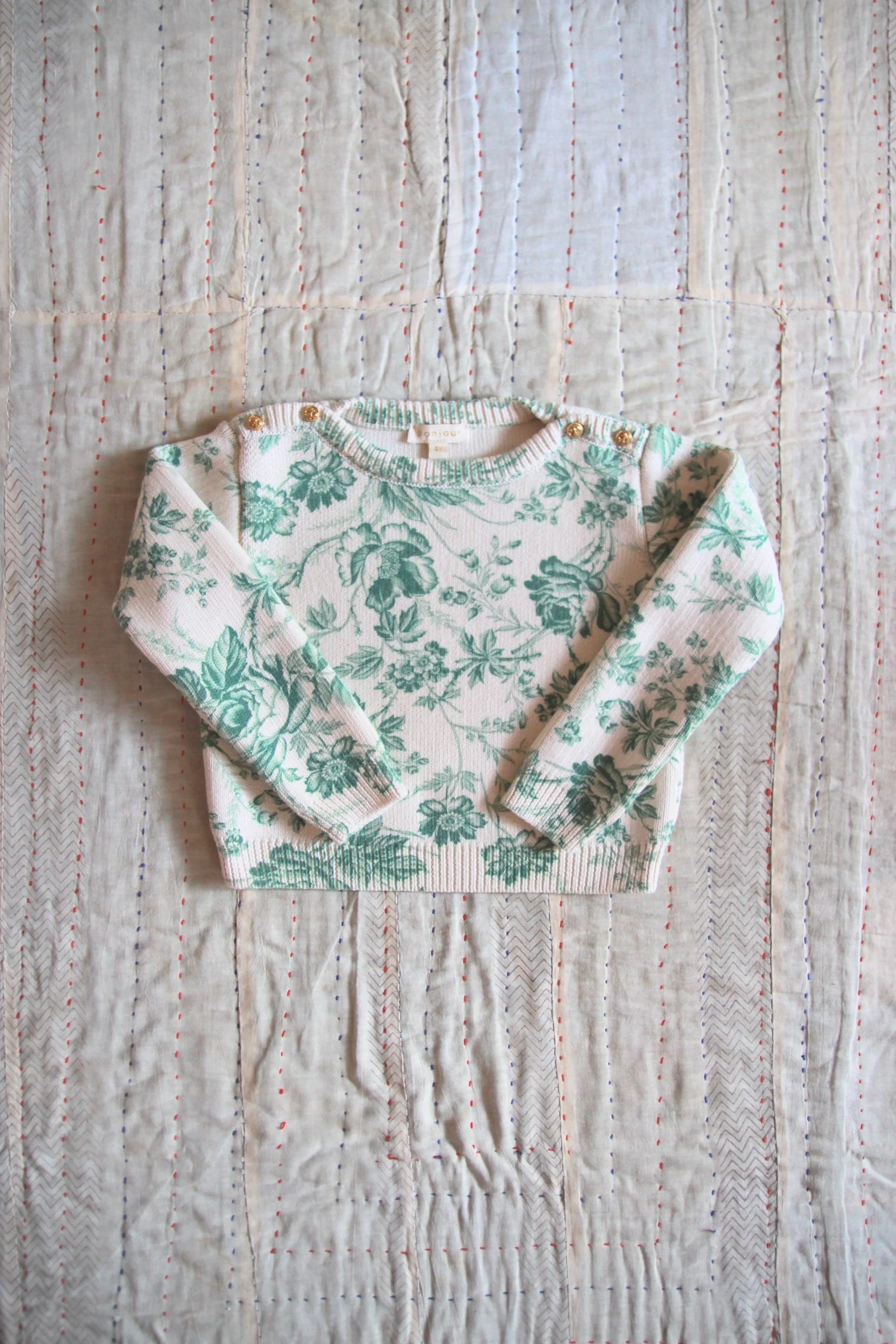 green floral print wallpaper sweater