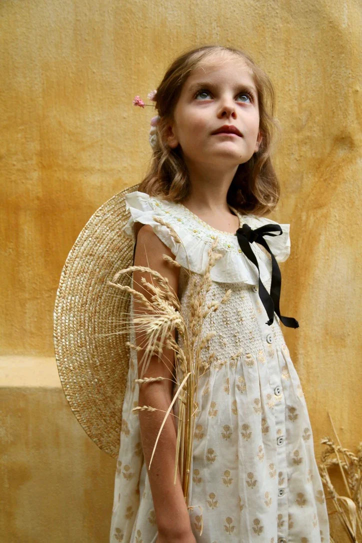 American armhole tunic and its bow barrette