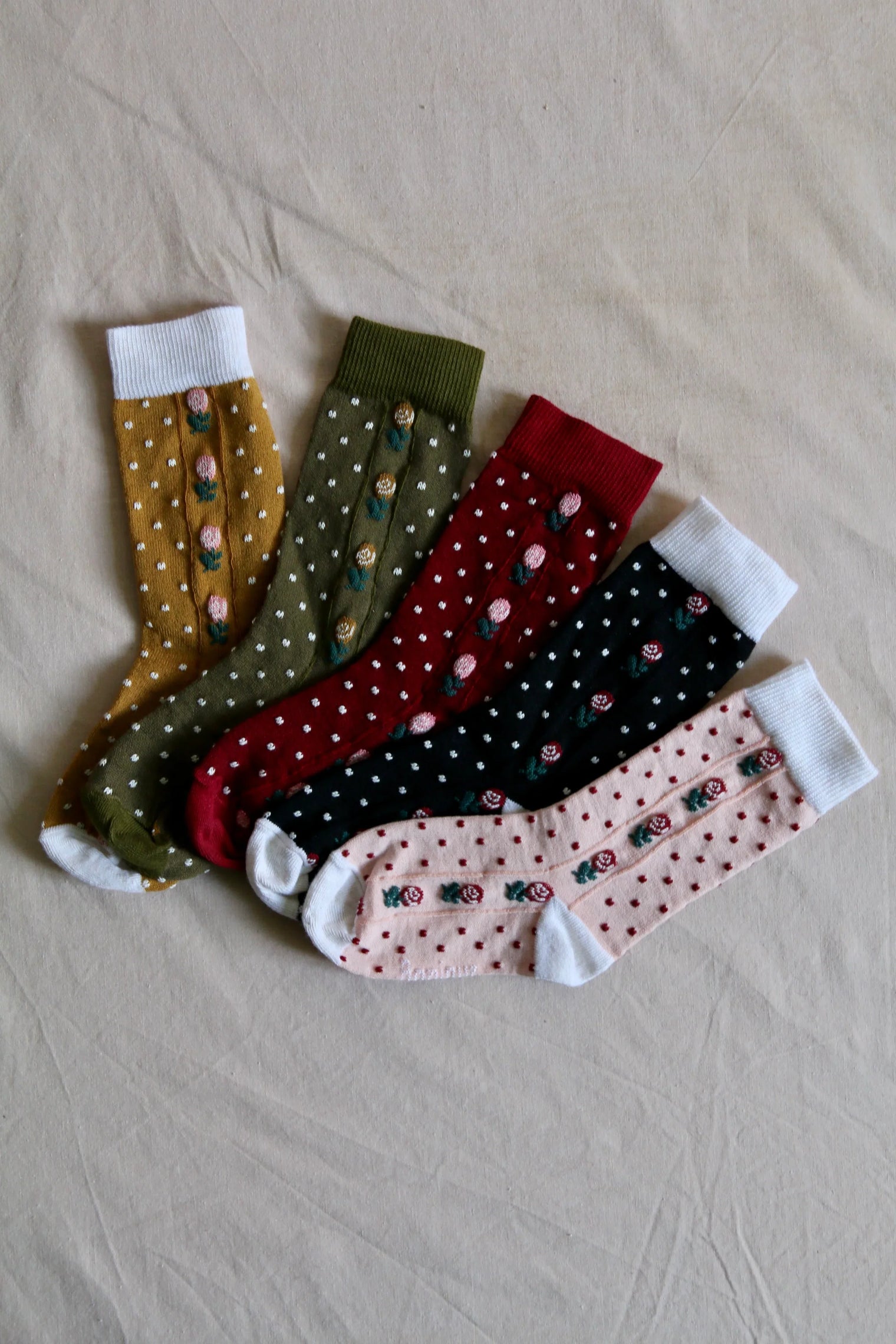 Chaussettes pois et fleurs vert mousse