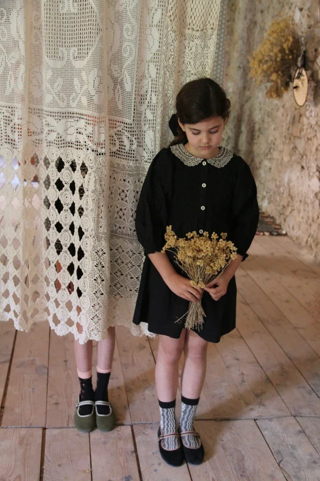 Tunique pois noir et sa barrette assortie