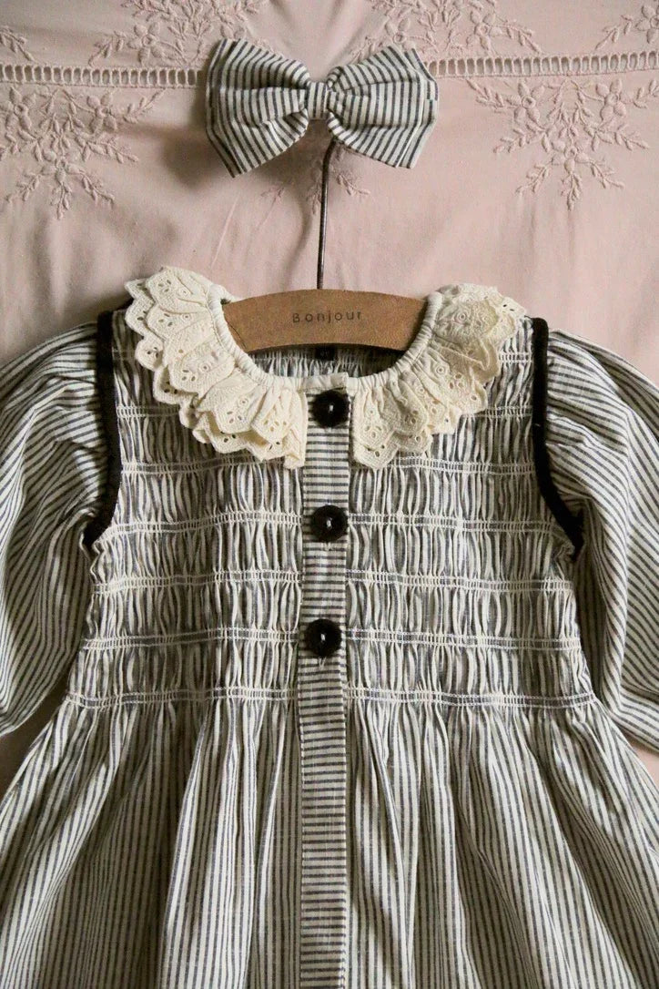 Tunique rayure noire / ivoire et sa barrette assortie