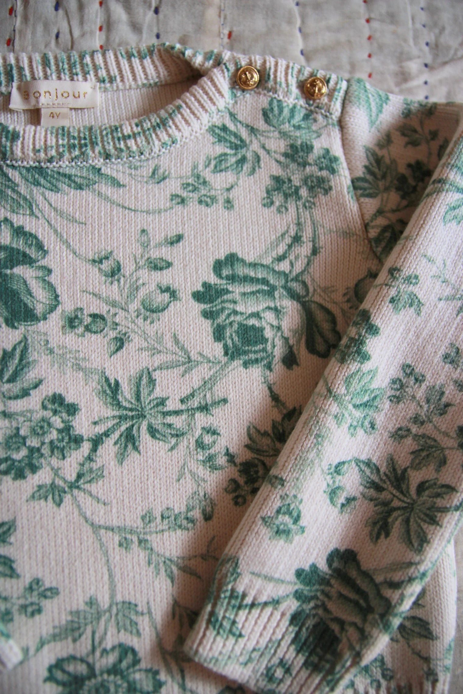 green floral print wallpaper sweater