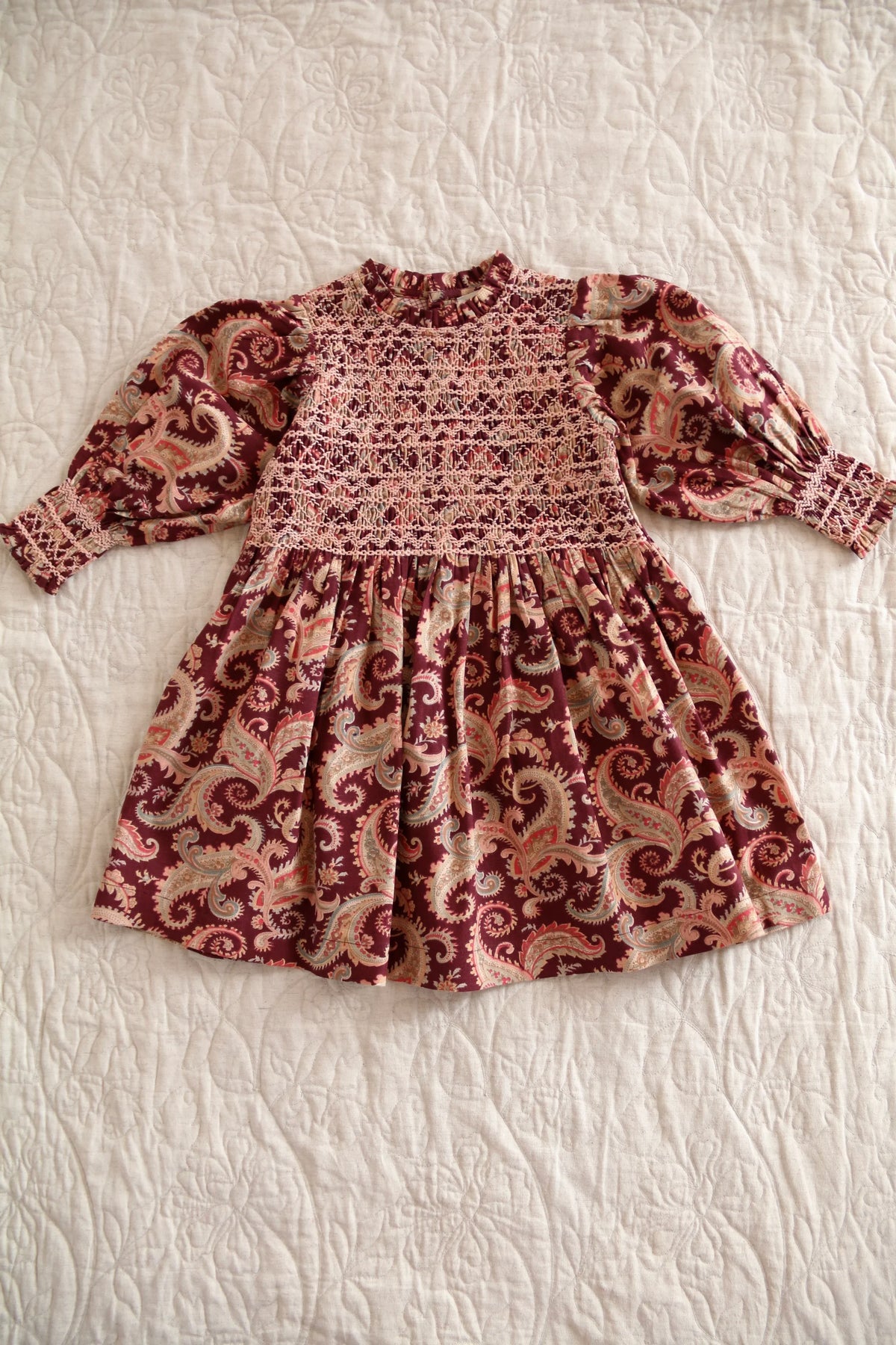 Robe à smocks cashemere burgundy et son col crochet