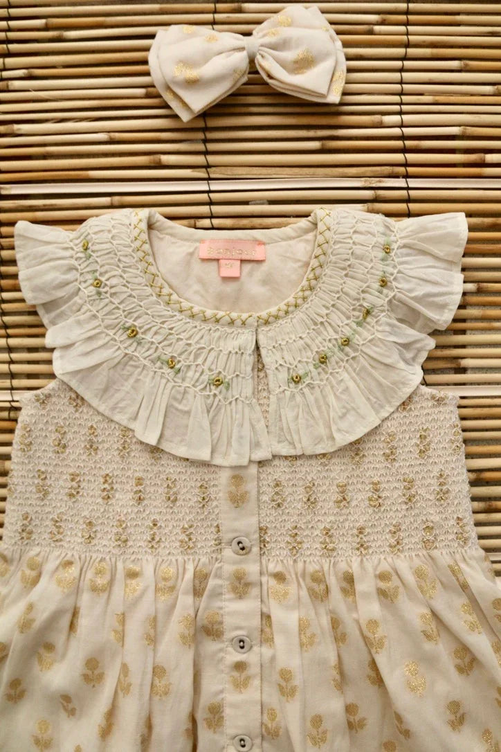 American armhole tunic and its bow barrette