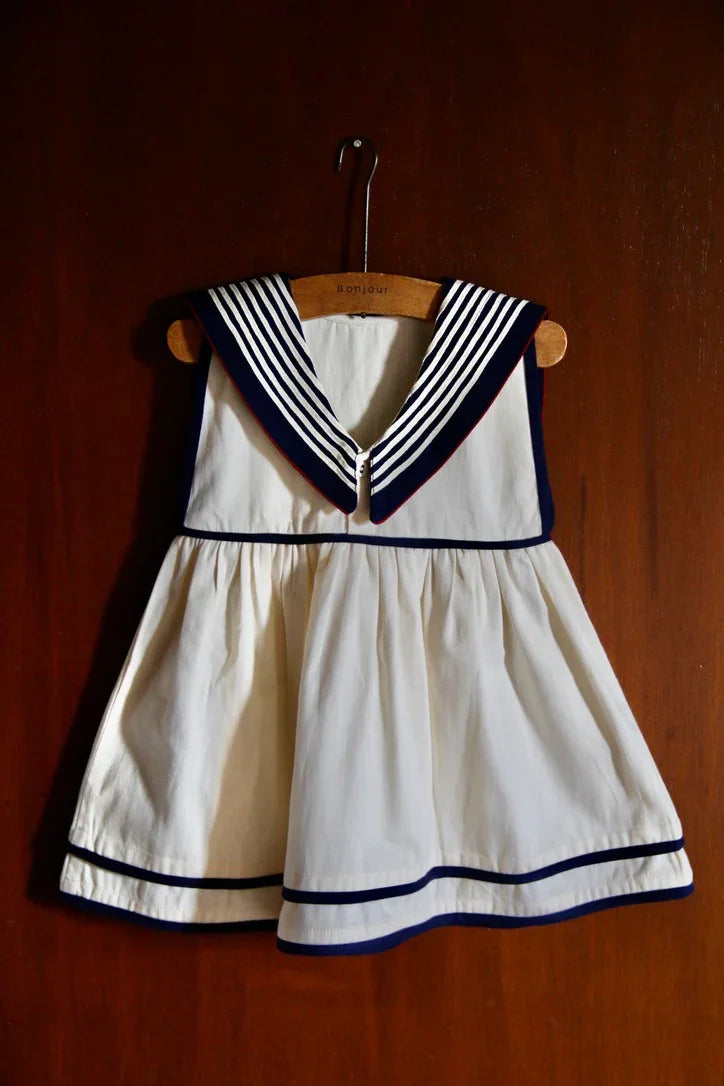 the ivory sailor-collar dress