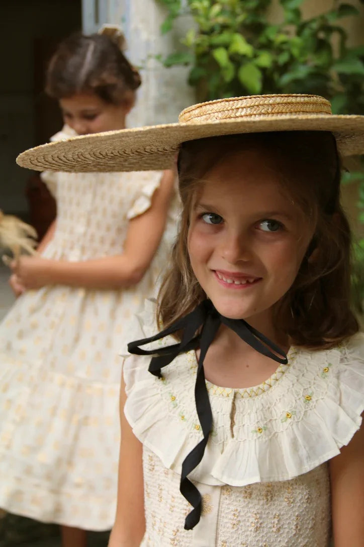 American armhole tunic and its bow barrette