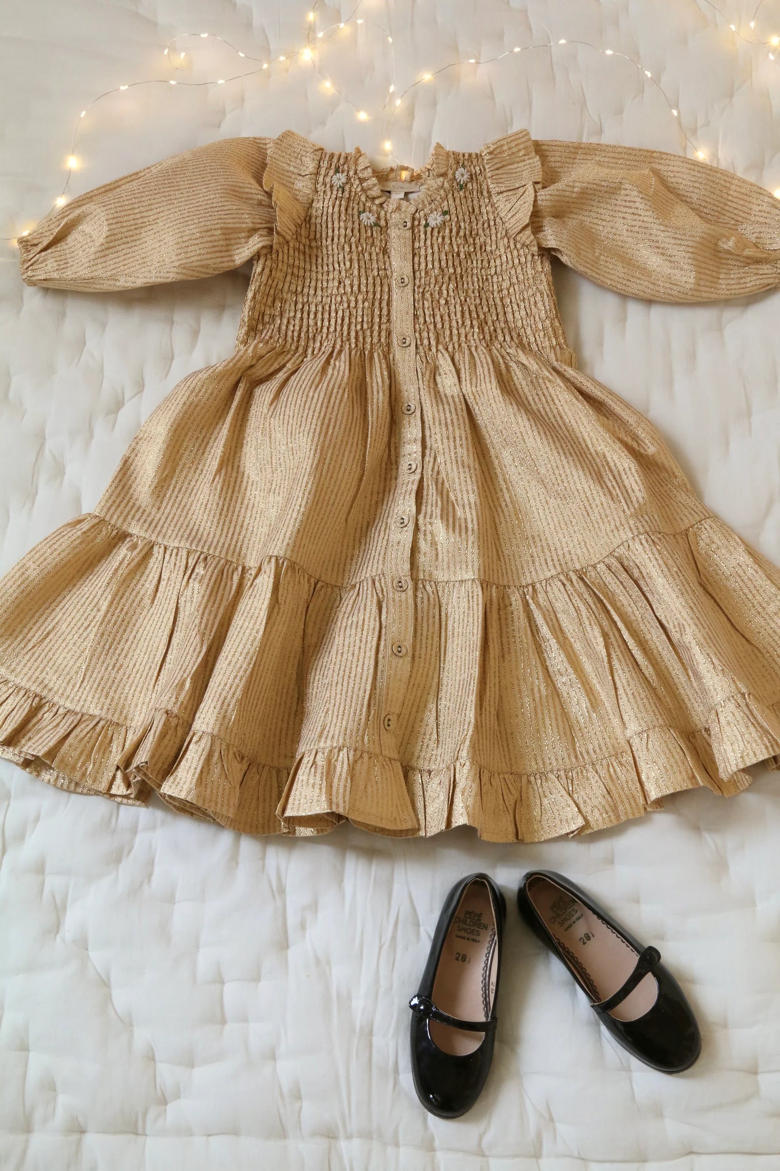 Long striped dress with golden sequins