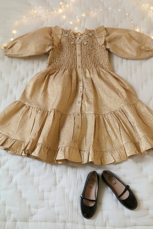 Long striped dress with golden sequins
