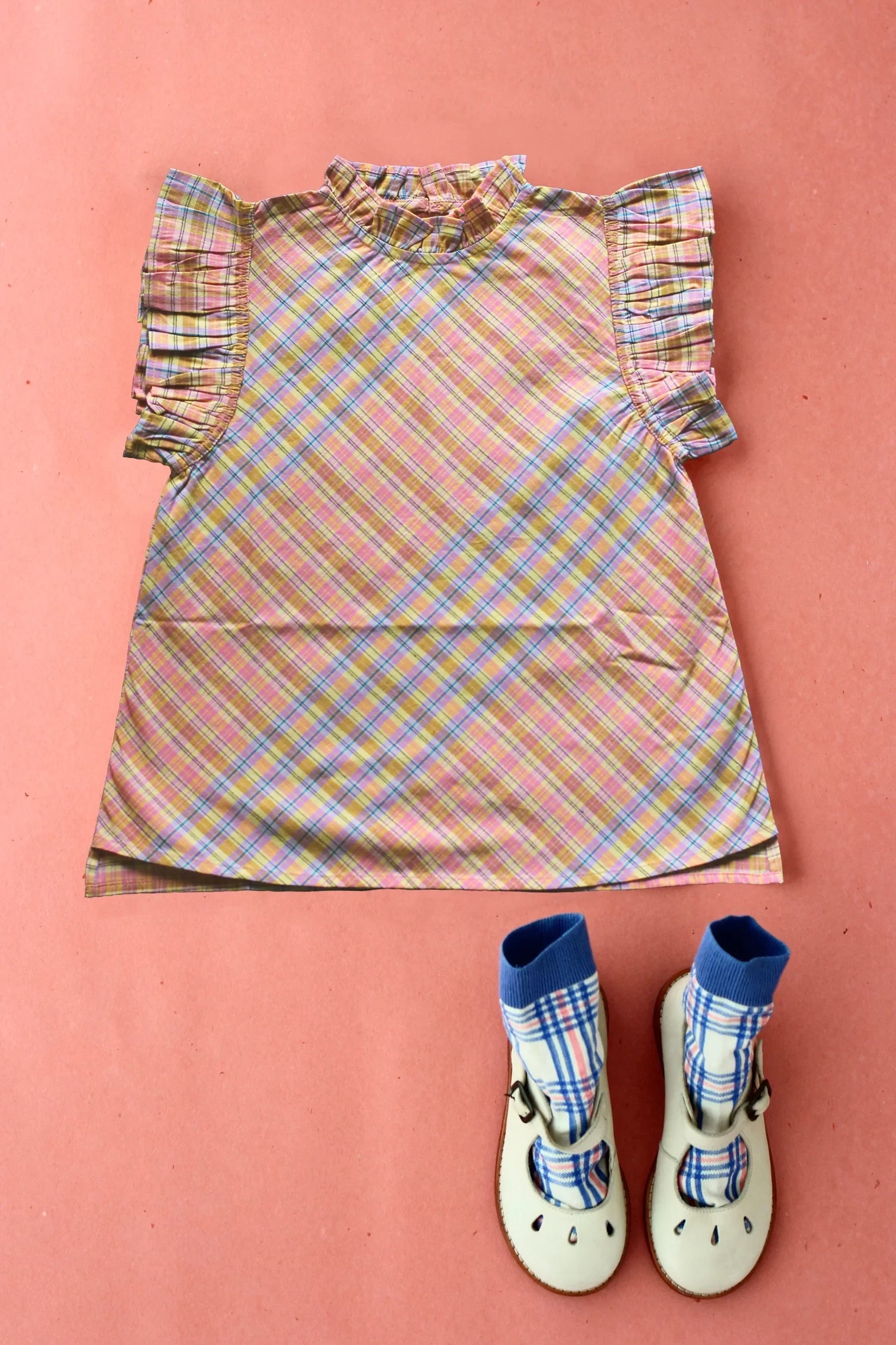 Rainbow check ruffle top