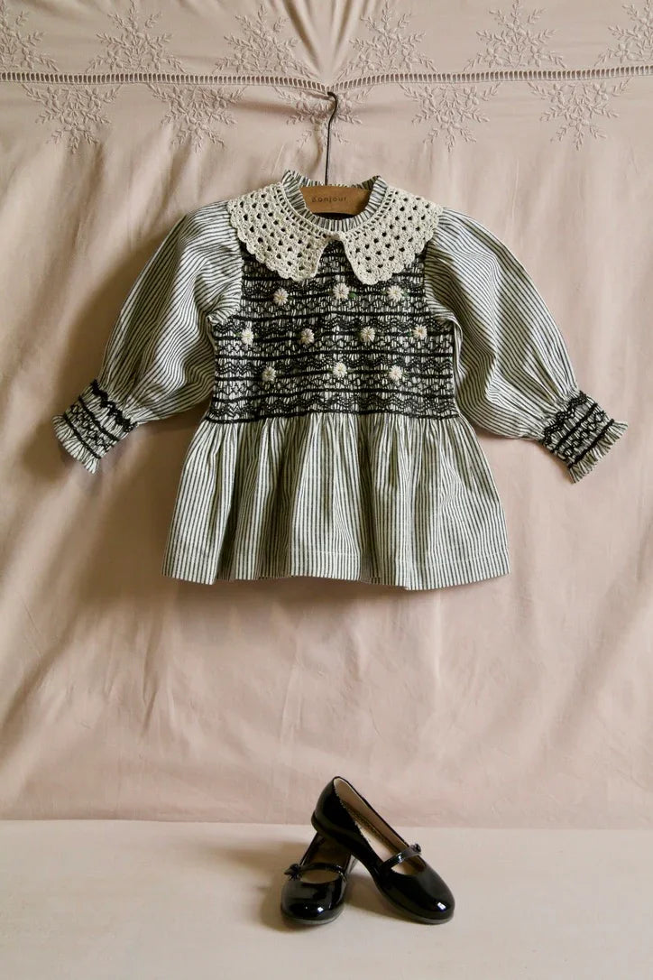 Blouse with smocked stripes and removable crochet collar
