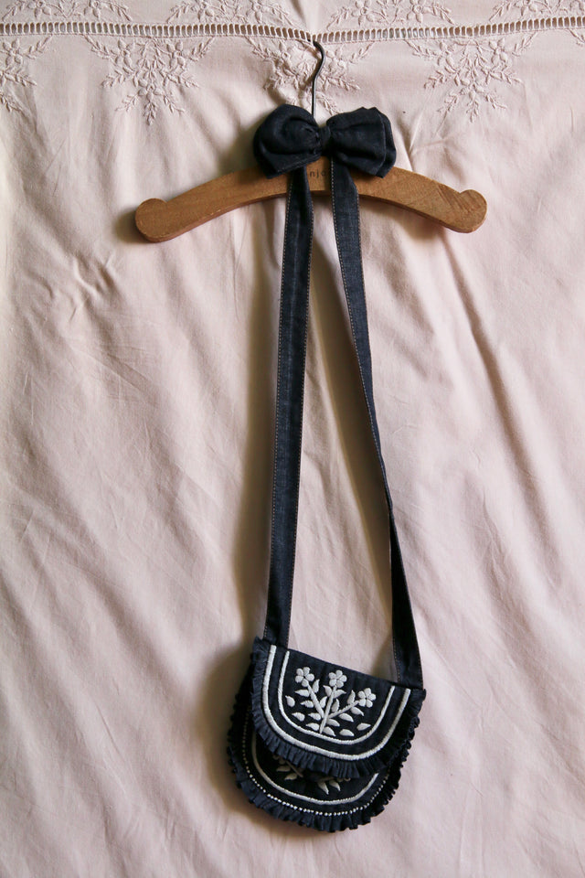 Small black denim embroidered bag and its matching hair clip