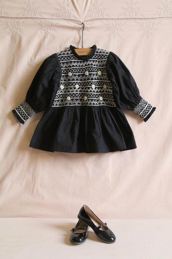Blouse with black polka dot smocking and removable crochet collar