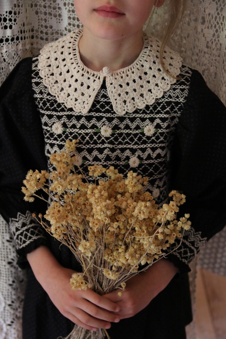 Blouse with black polka dot smocking and removable crochet collar