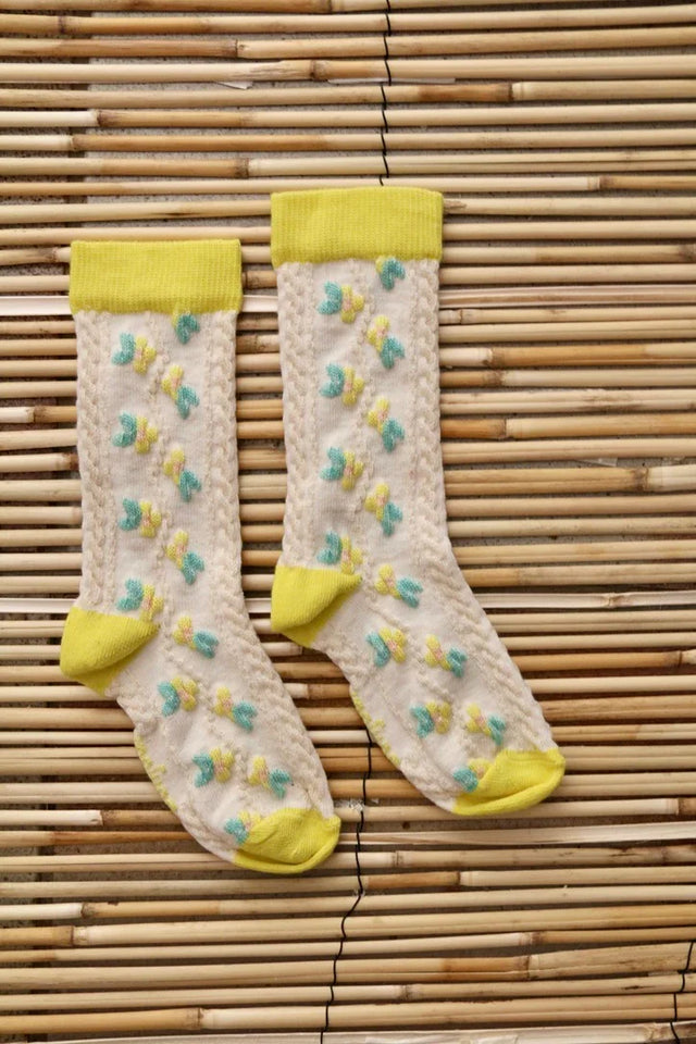 Chaussette farandole de fleurs citron