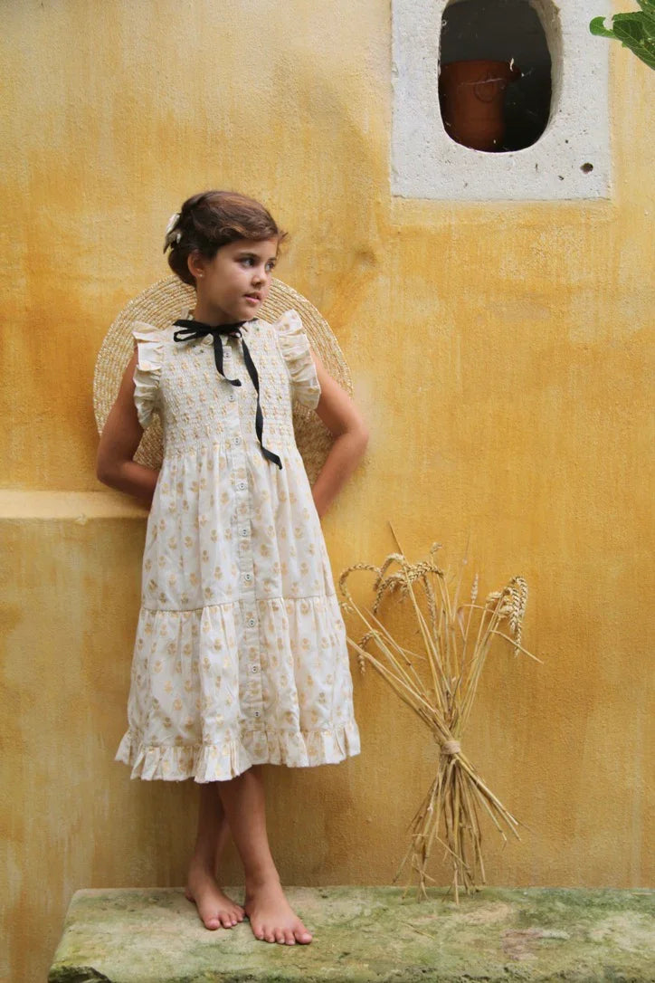 Robe longue fleur dorée sur ivoire