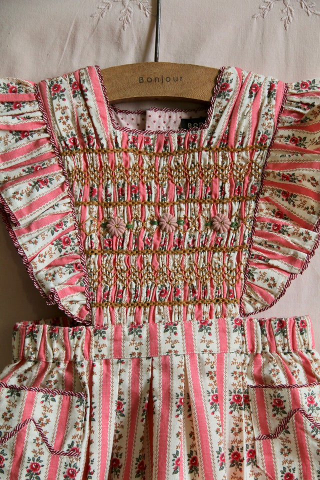 Pinafore dress striped wallpaper pink