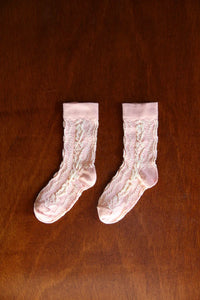Chaussette torsade rose