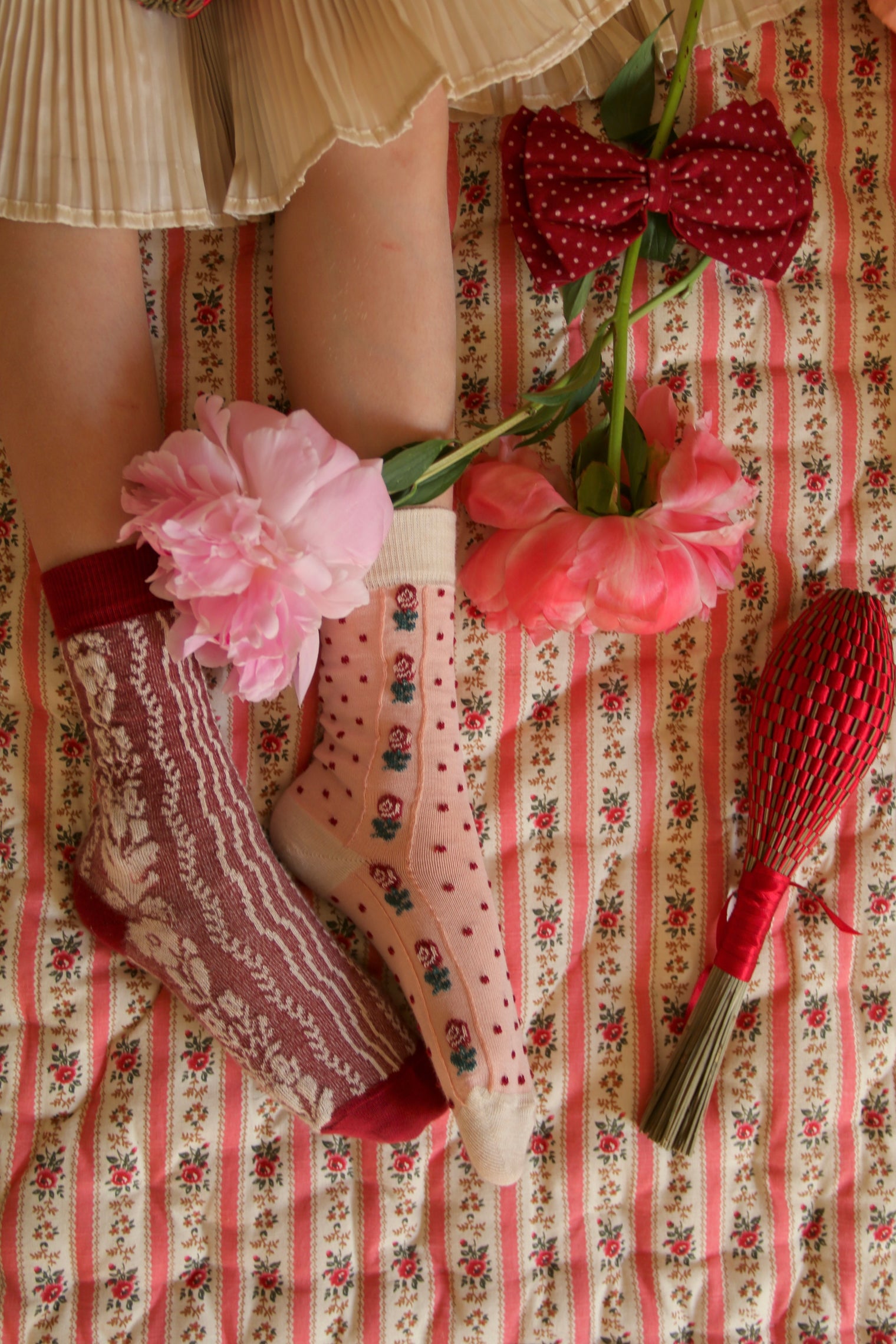 Red sock with twisted green flowers