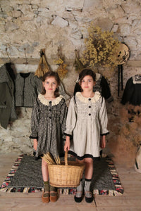 Black / ivory striped tunic and matching hair clip