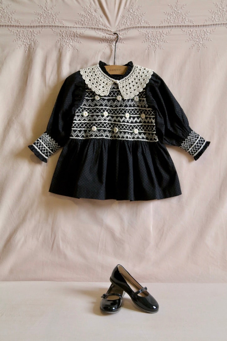 Blouse with black polka dot smocking and removable crochet collar