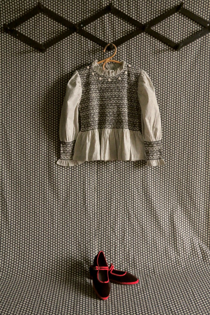 Black & ivory striped smocked blouse