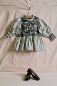 Blouse with smocked stripes and removable crochet collar