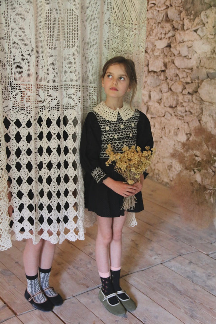 Blouse with black polka dot smocking and removable crochet collar