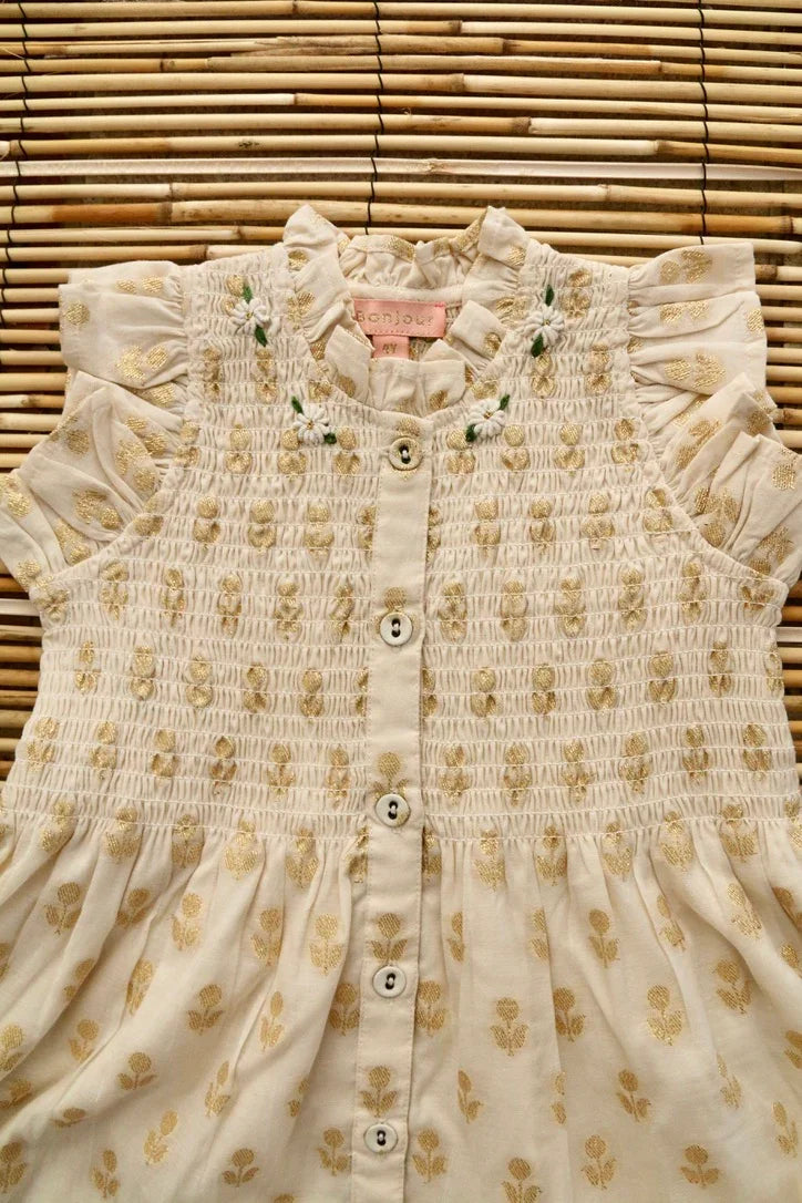 Robe longue fleur dorée sur ivoire