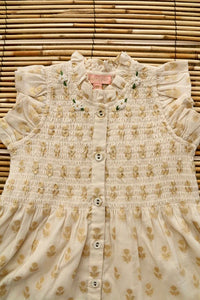 Robe longue fleur dorée sur ivoire