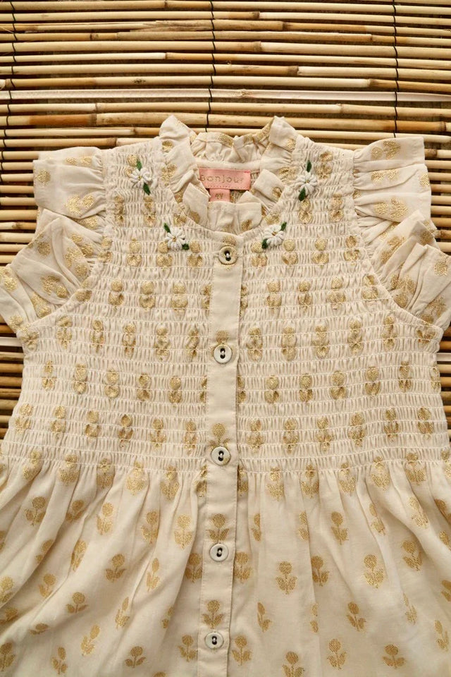 Robe longue fleur dorée sur ivoire