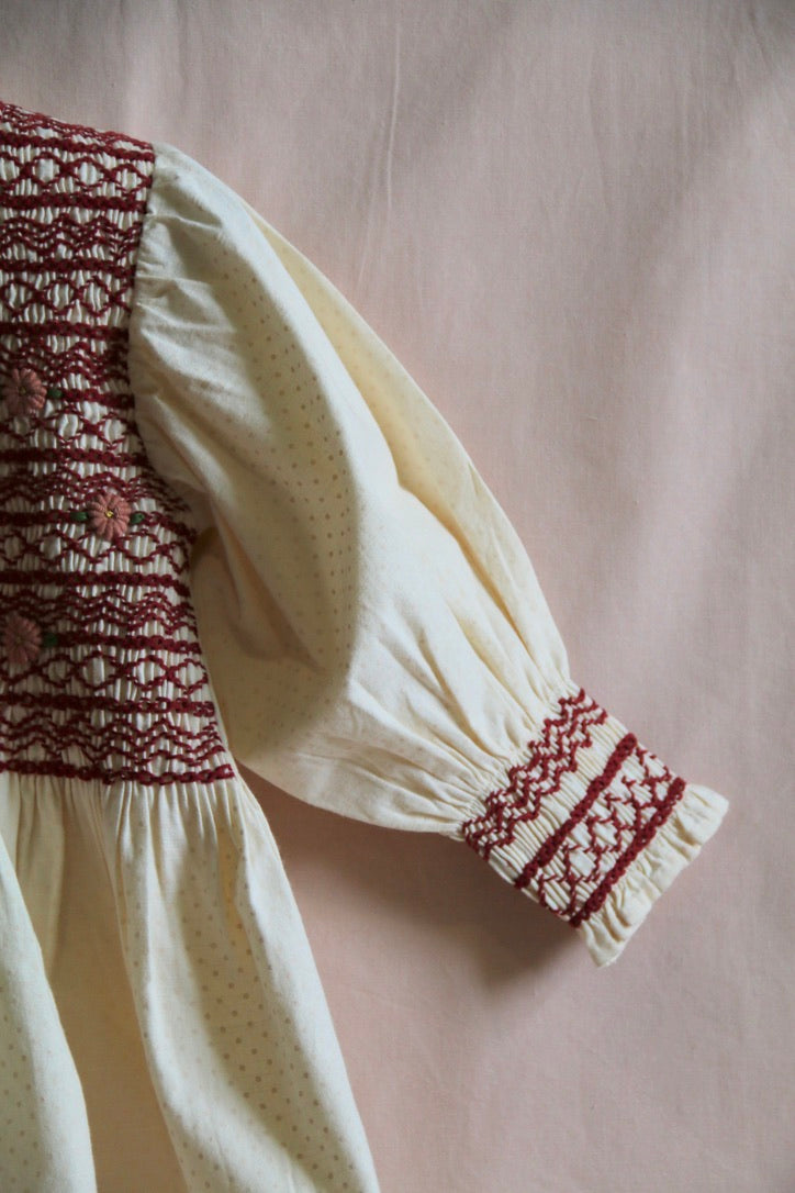 Blouse with ivory polka dot smocking and removable crochet collar