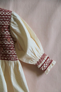 Blouse with ivory polka dot smocking and removable crochet collar