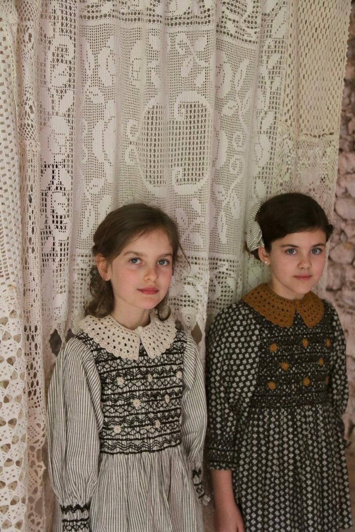 Blouse with smocked stripes and removable crochet collar