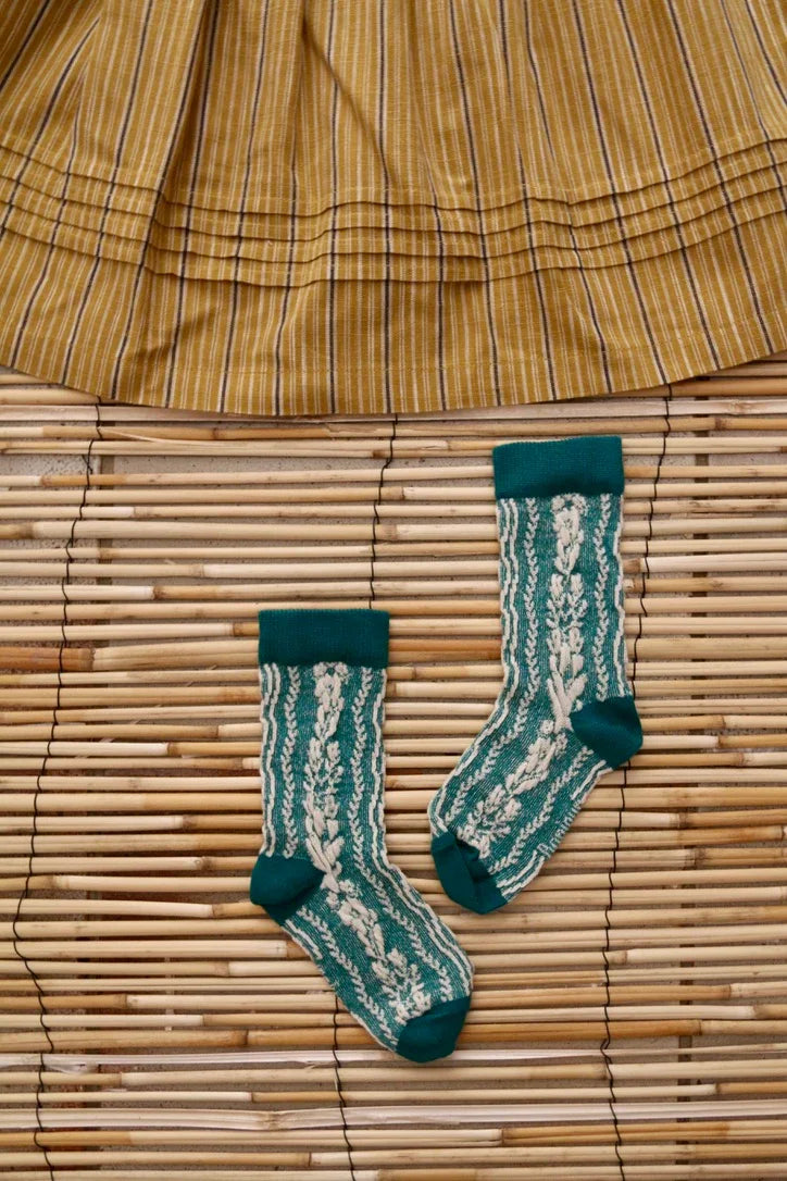 Chaussette torsade de fleurs vertes