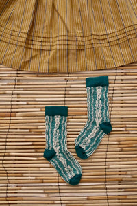 Chaussette torsade de fleurs vertes