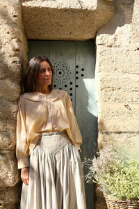 Butter-colored blouse with embroidered sailor collar