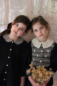 Blouse with black polka dot smocking and removable crochet collar
