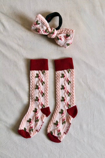 Chaussettes farandole de fleurs rose et son élastique noeud pour les cheveux