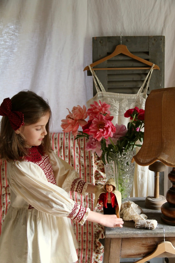 Blouse with ivory polka dot smocking and removable crochet collar