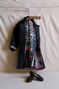 Quilted black denim trench coat