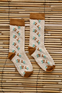 Chaussette farandole de fleurs caramel