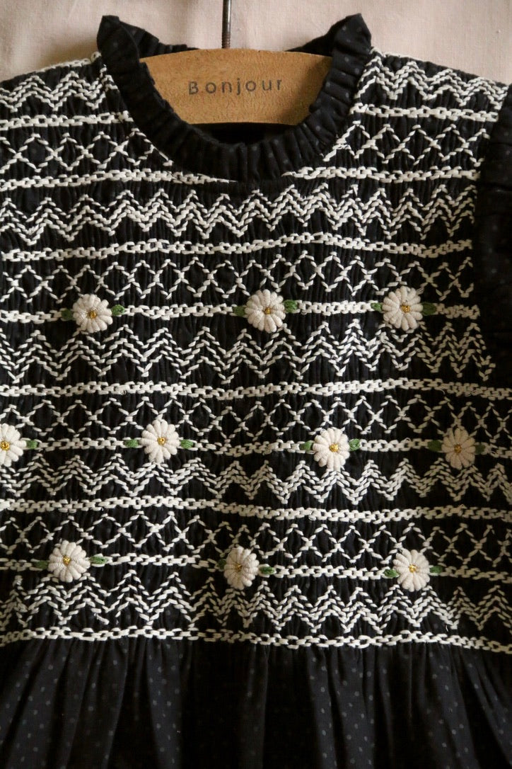 Blouse with black polka dot smocking and removable crochet collar