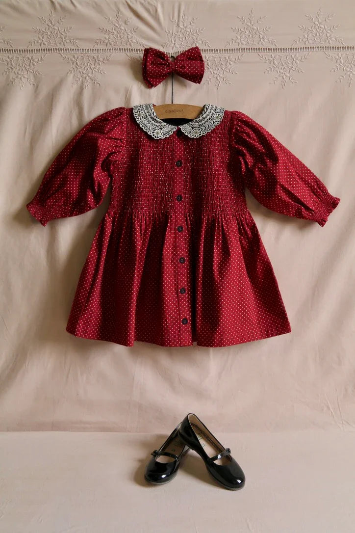 Red polka dot tunic and matching hair clip
