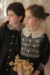 Blouse with black polka dot smocking and removable crochet collar