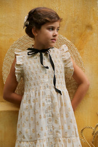 Robe longue fleur dorée sur ivoire