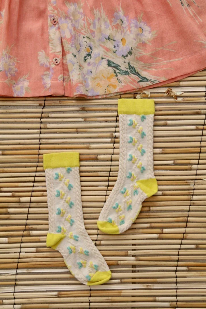 Chaussette farandole de fleurs citron
