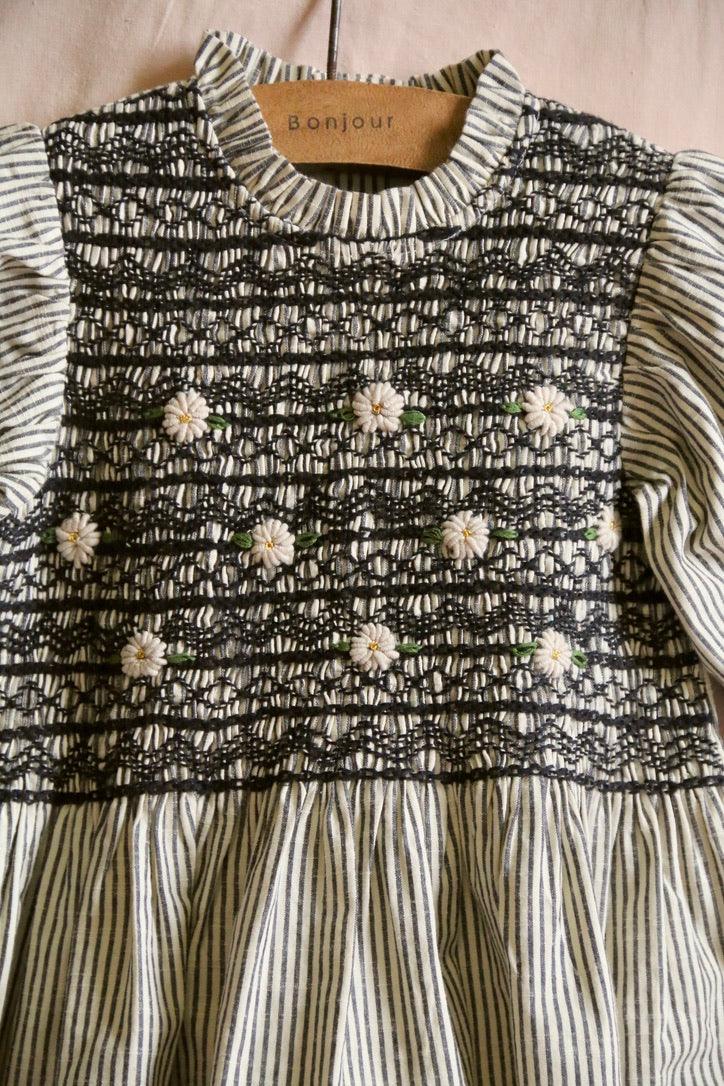 Blouse with smocked stripes and removable crochet collar