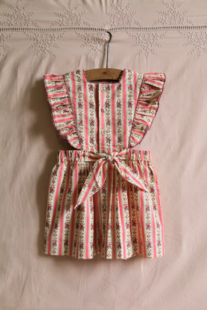 Pinafore dress striped wallpaper pink